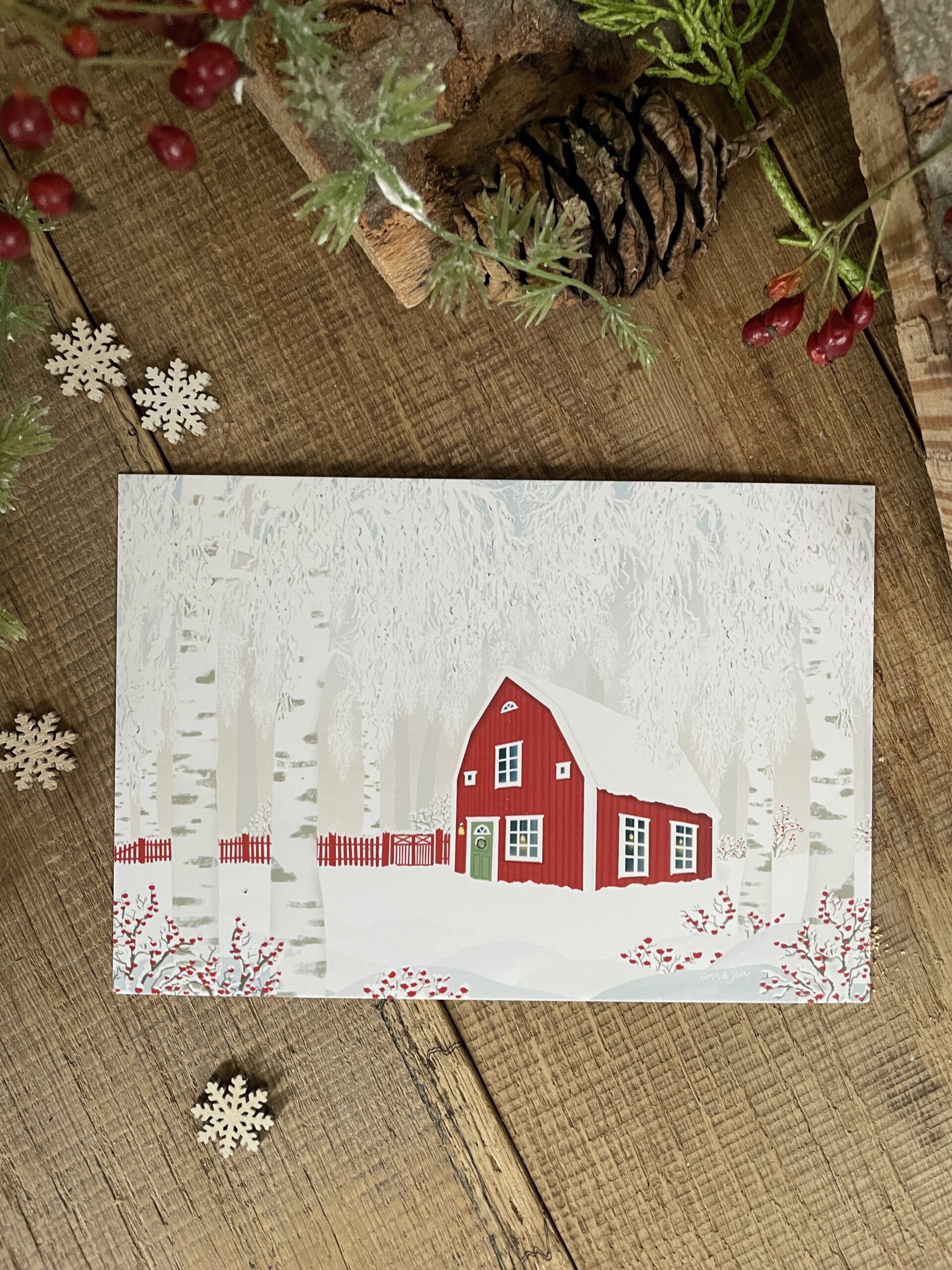 Postkarte Winterzeit Detailansicht rotes Schwedenhaus Schnee Winter handillustriert Ann und Jan
