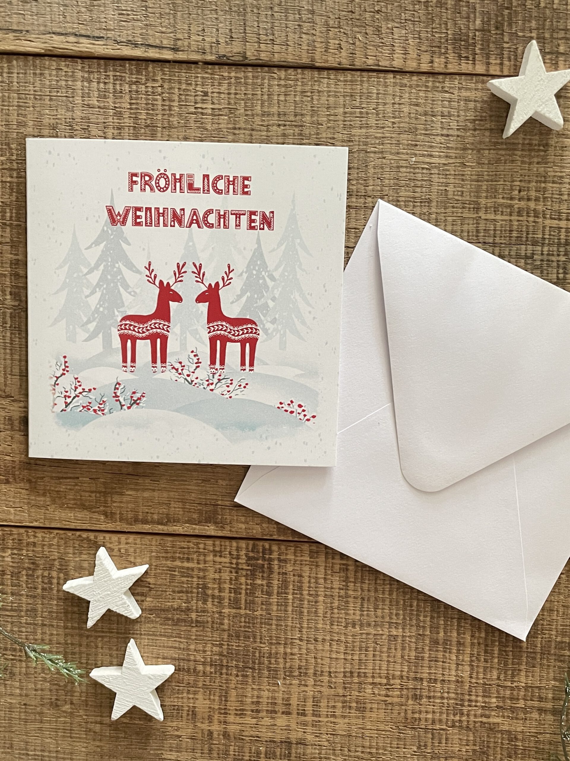 Klappkarte Weihnachtswald Innenseite beschreibbar quadratisches Kuvert weiß Ann und Jan