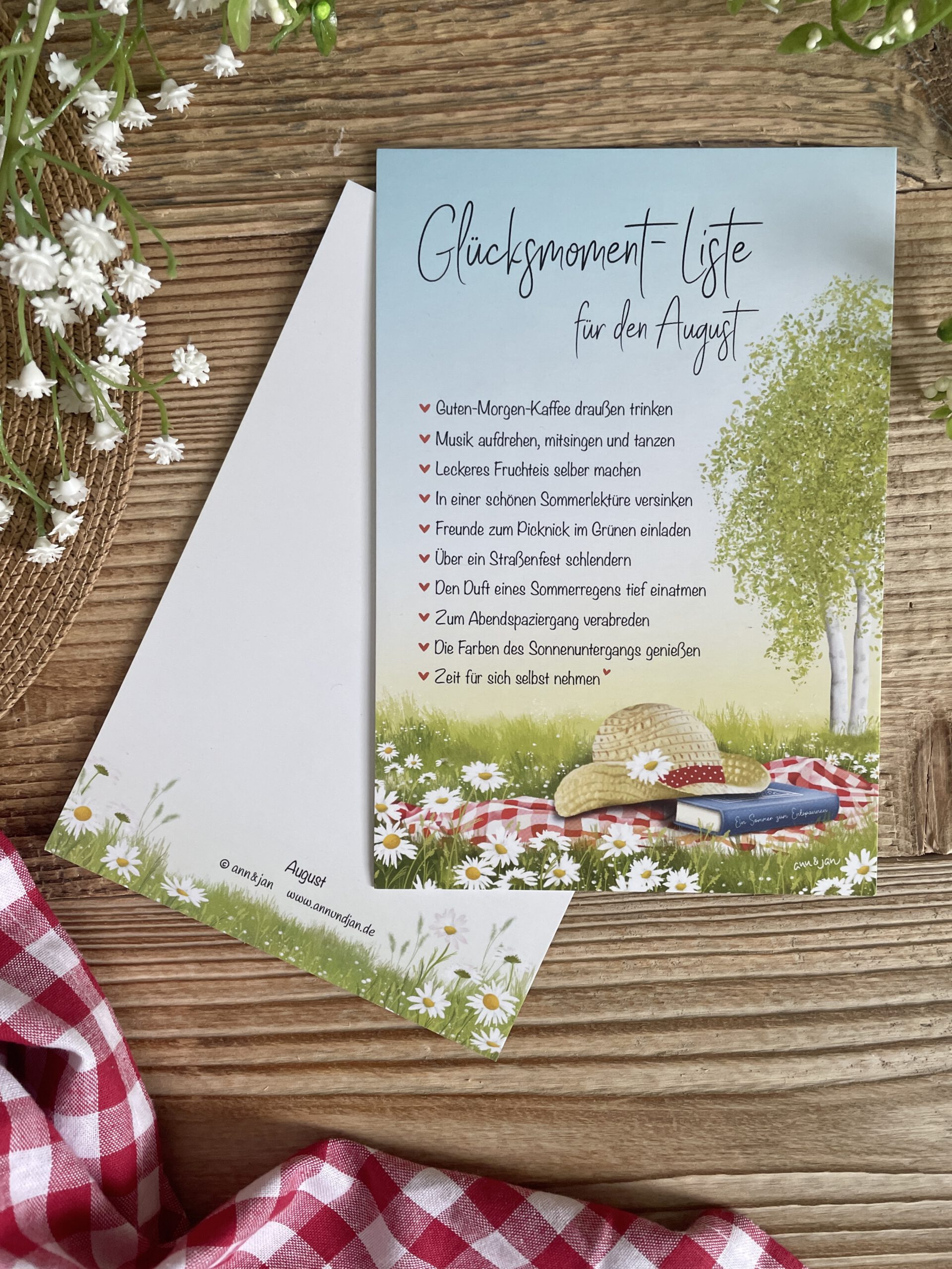 Handillustrierte große Postkarte Glücksmomente August Picknickdecke Margeriten Birken Sonnenhut von Ann und Jan