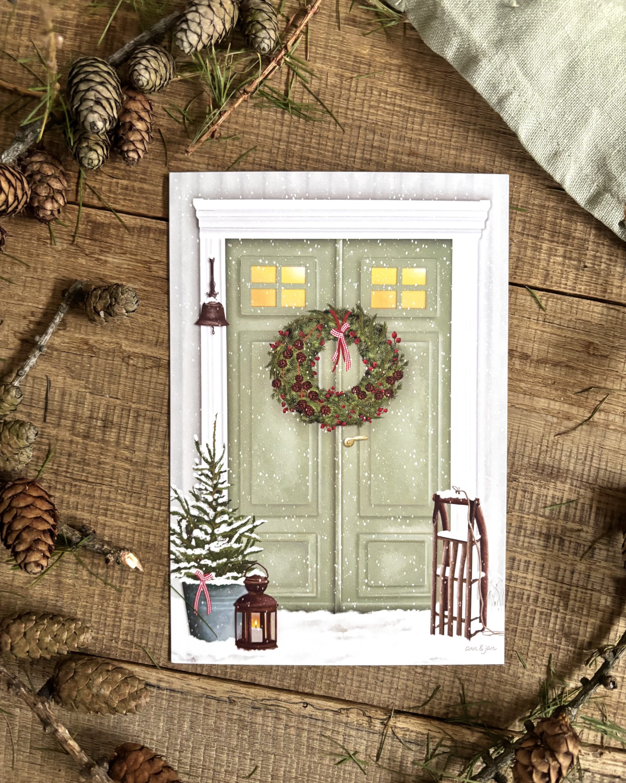 Postkarte Winterliches Zuhause Detailansicht winterlicher Hauseingang handillustriert Ann und Jan