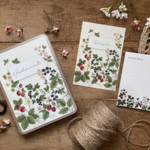 Geschenkset Emma mit Aufbewahrungsbox „Glücksmomente", Postkarte „Beerengarten" und Notizblock „Frida"
